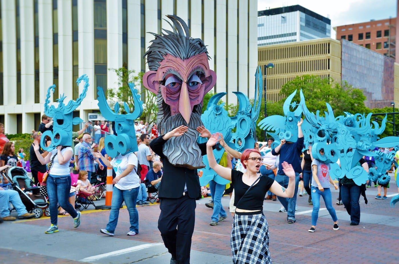 Inaugural Riverfest artist-in-residence Wayne White shows off large-scale puppets made in collaboration with local artists at the festival’s Sundown parade (photo courtesy of Wichita Festivals, Inc., Wichita, KS)