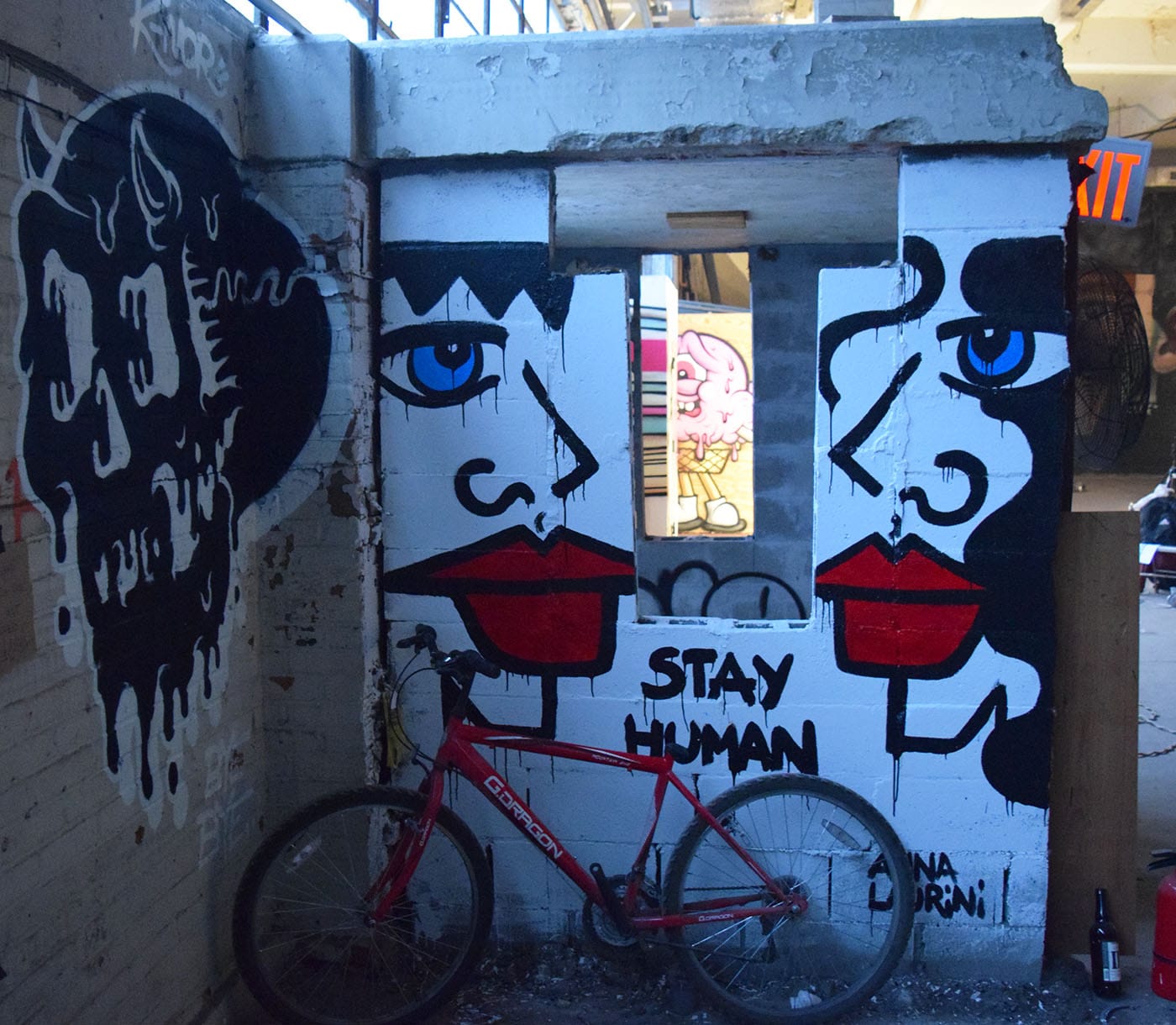 Installation view of Market Surplus with smaller murals