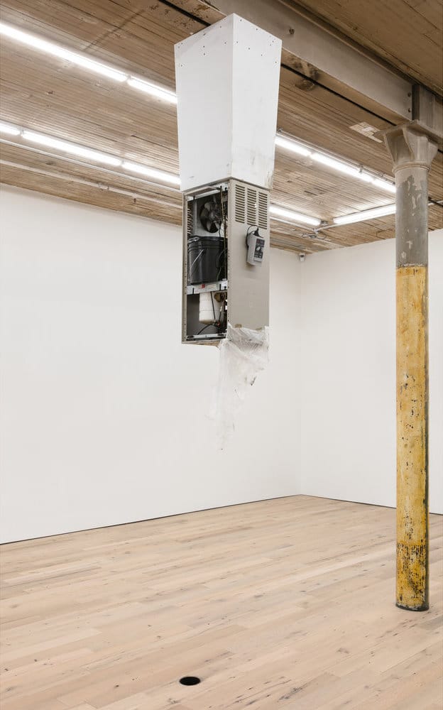 Pope.L, "Pedestal" (2017), acrylic paint, drain, Elkay drinking fountain #EFA201F, hardware, hole, photo timer, plastic pail, plastic sheeting, solenoid, tape, tubing, and wood, dimensions variable