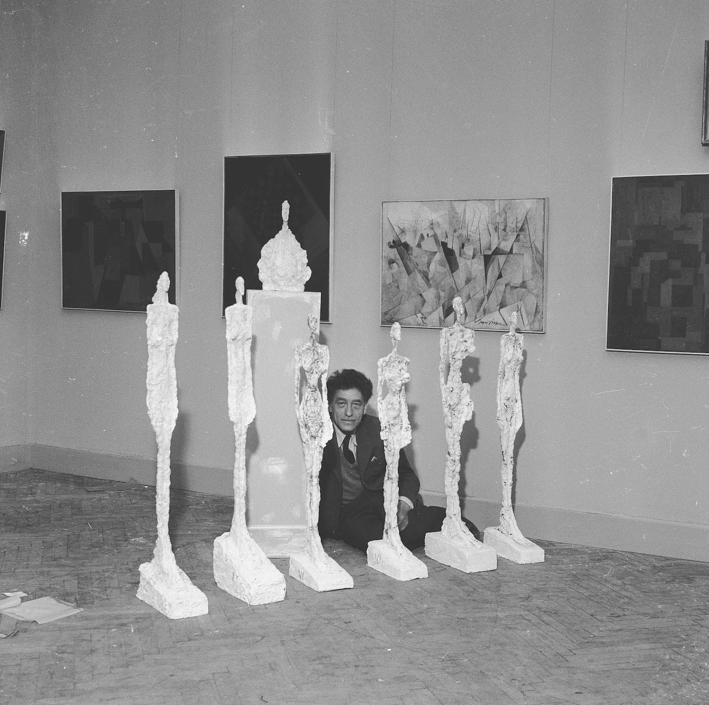 Alberto Giacometti and his sculptures at the Venice Biennale, 1956 (courtesy Archives of the Giacometti Foundation)