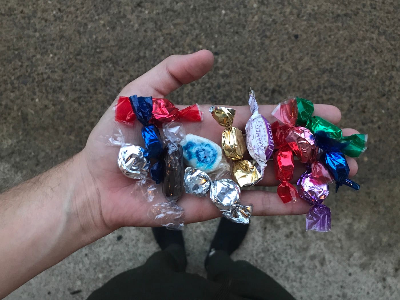 The author's collection of candies from Felix Gonzalez-Torres works (photo by the author for Hyperallergic)