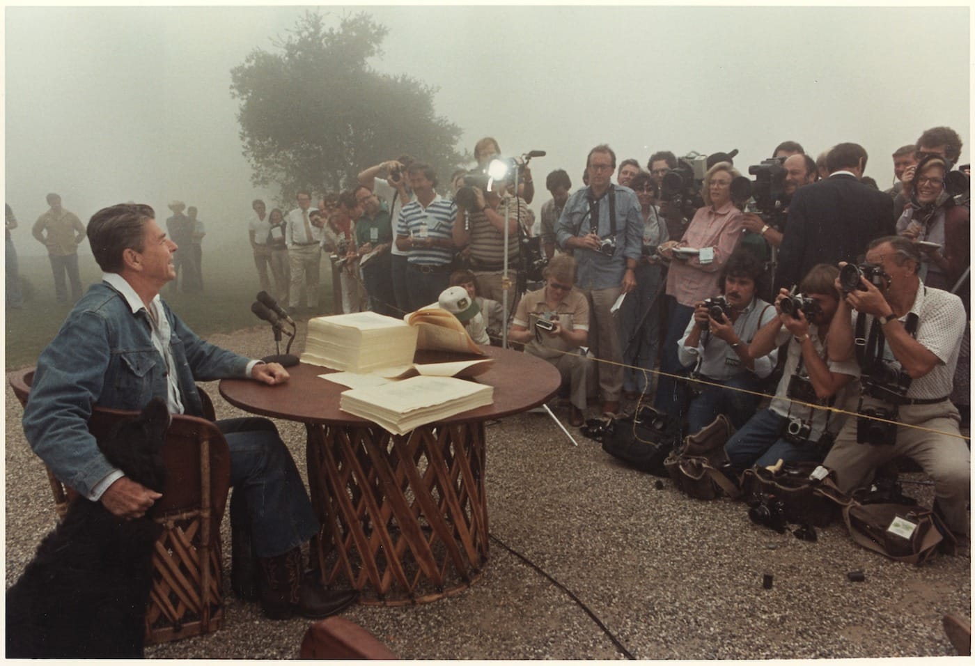 President Ronald Reagan signs the Economic Recovery Tax Act of 1981, Rancho del Cielo, CA (1981), as seen in The Reagan Show, directed by Pacho Velez and Sierra Pettengill. (photo by Karl Schumacher, courtesy of the Ronald Reagan Presidential Library; Gravitas Ventures and CNN Films)