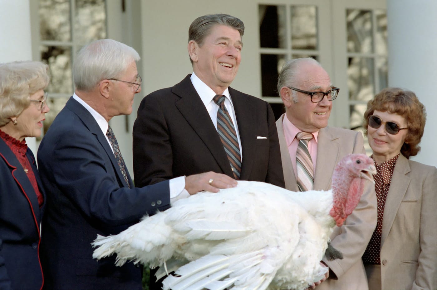 President Ronald Reagan receiving a turkey for the 36th Annual Thanksgiving Turkey Ceremony at the White House, (1981), as seen in <em/>The Reagan Show, directed by Pacho Velez and Sierra Pettengill. (photo courtesy of the Ronald Reagan Presidential Library; Gravitas Ventures and CNN Films)