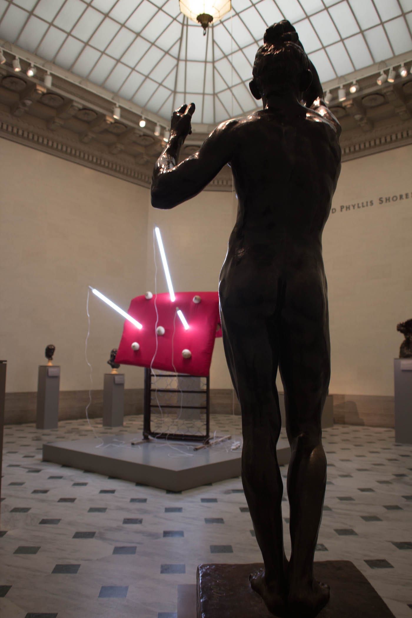 “Age of Bronze” (1876) by Auguste Rodin confronting “My Disease” (2017) by Sarah Lucas.