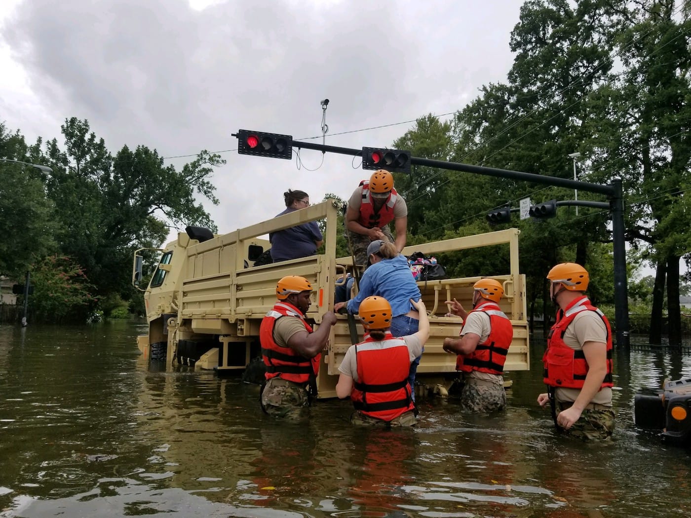 Texas National Guard soldiers conduct rescue operations in flooded areas around Houston, Texas, on August 27, 2017. (photo by 1Lt. Zachary West, 100th MPAD; courtesy Texas National Guard, via Wikimedia Commons)