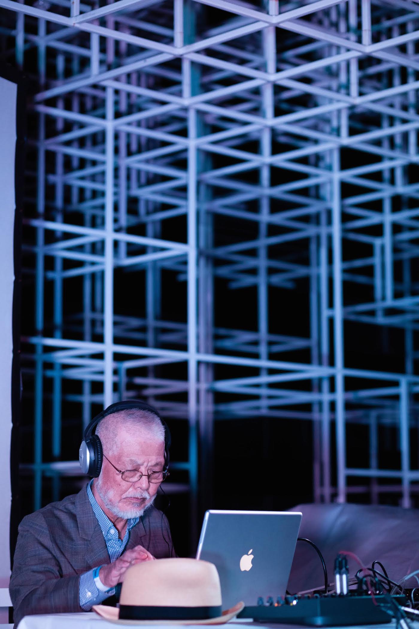 Yasunao Tone performing (photo by Plastiques Photography, courtesy of Serpentine Galleries, London)