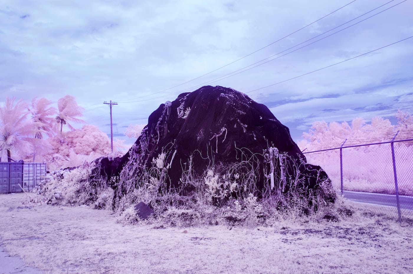 Sanne De Wilde, "A pile of fishing nets in the shape of a mountain close to the domestic air- port in Pohnpei from where the tiny airplane (carrying 4-6 people) sets off to Pingelap." (© Sanne De Wilde)