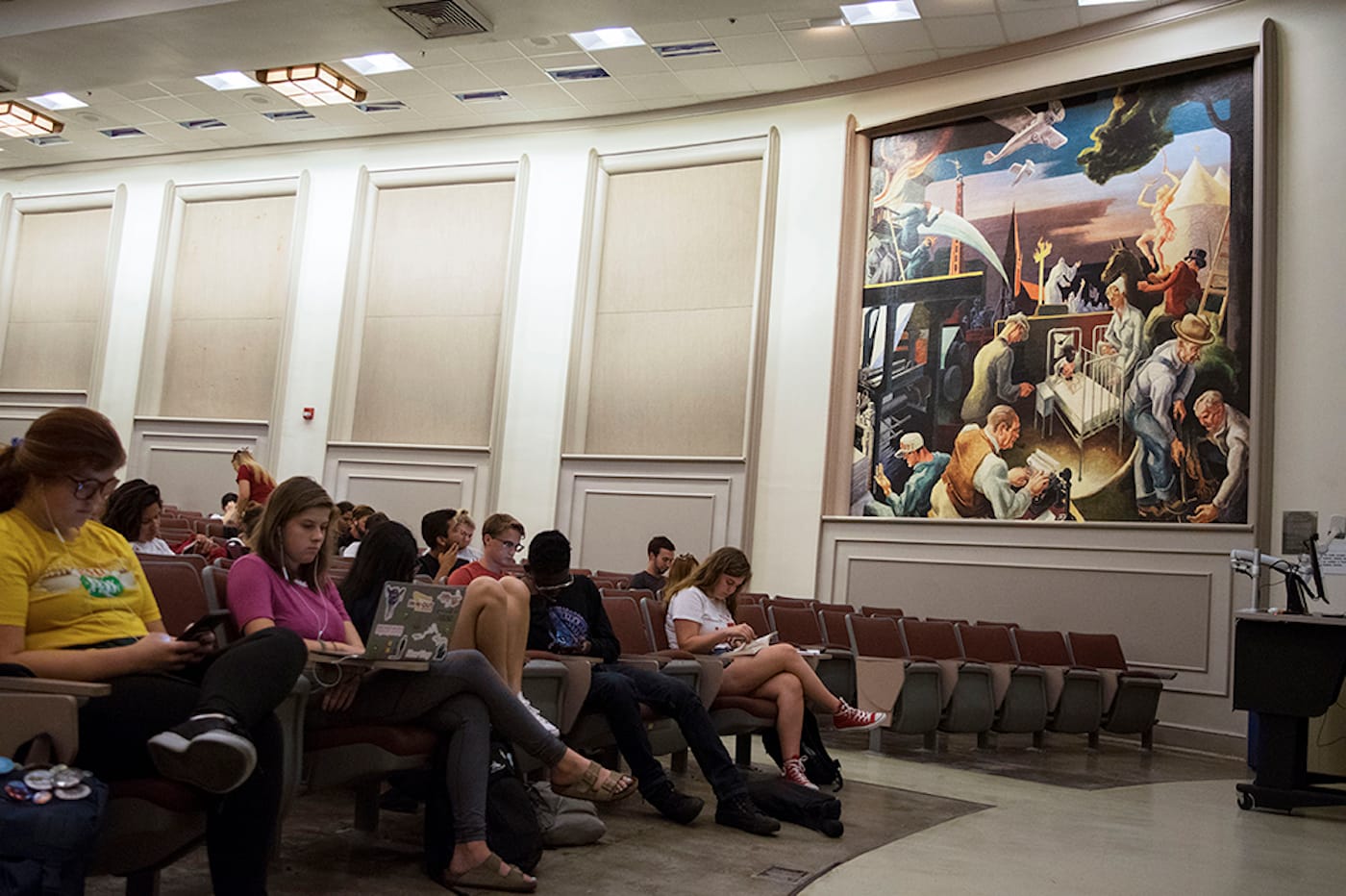 Students gather for class under the controversial panel, “Parks, the Circus, the Klan, the Press.” (photo by Emily Eckelbarger, courtesy of the Indiana Daily Student)