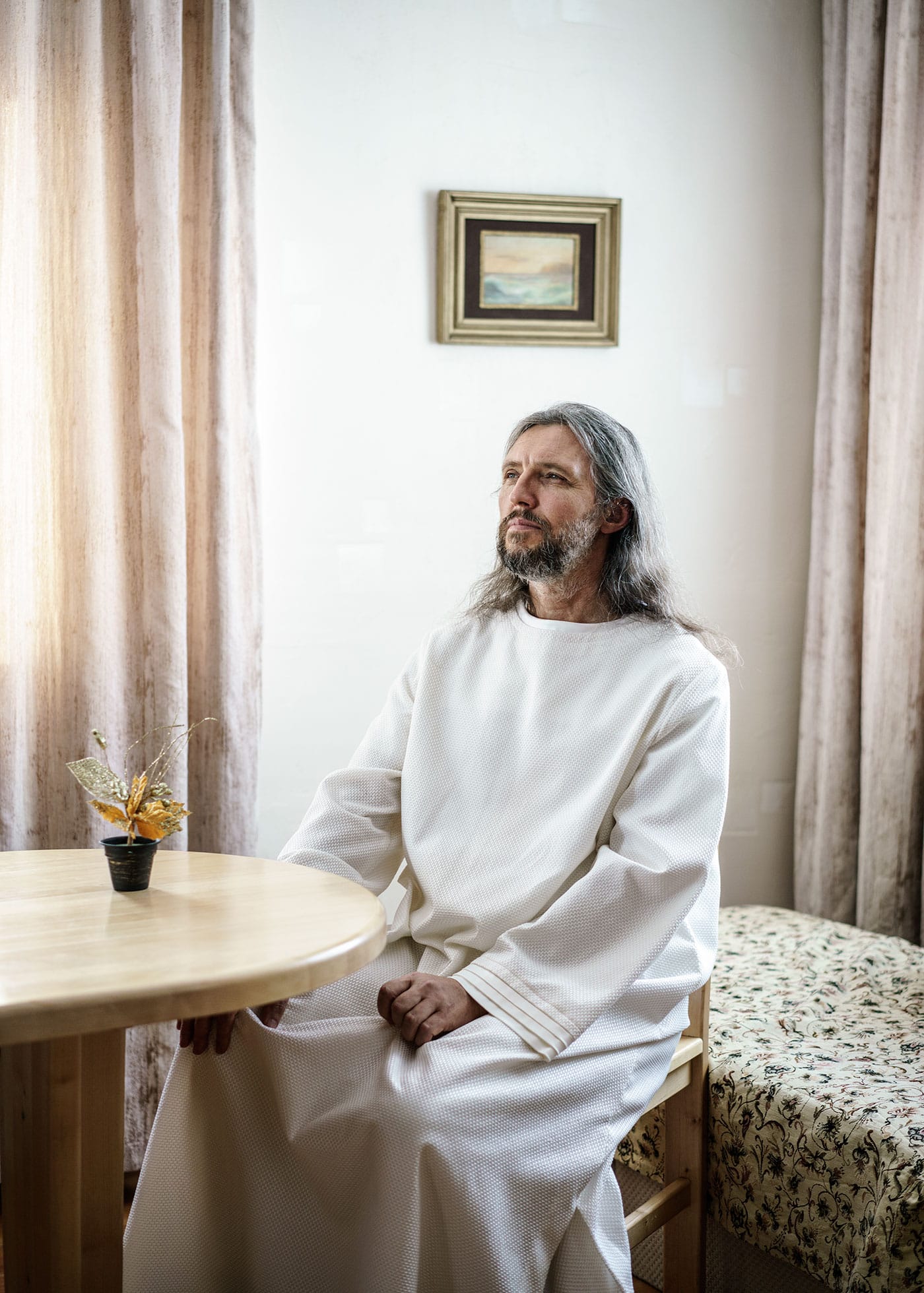 "Vissarion, the Christ of Siberia. Formerly a traffic policeman in the 1980s, he got his first revelation that he was Jesus Christ at the same time as the breakup of the Soviet Union. Since then he has gathered a following of 5,000–10,000 disciples in the Siberian forest. There they live in separate villages with their own infrastructure and social systems." (Russia, 2016), photograph by Jonas Bendiksen from <em>The Last Testament</em> (courtesy Aperture, © Jonas Bendiksen/Magnum Photos)