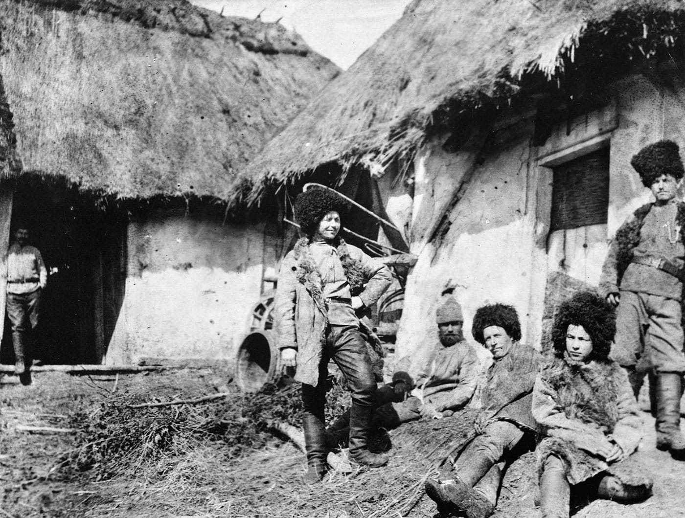 Florence Farmborough, "Russian Cossack troops in winter uniforms outside their accommodation huts." (© IWM (Q98429)