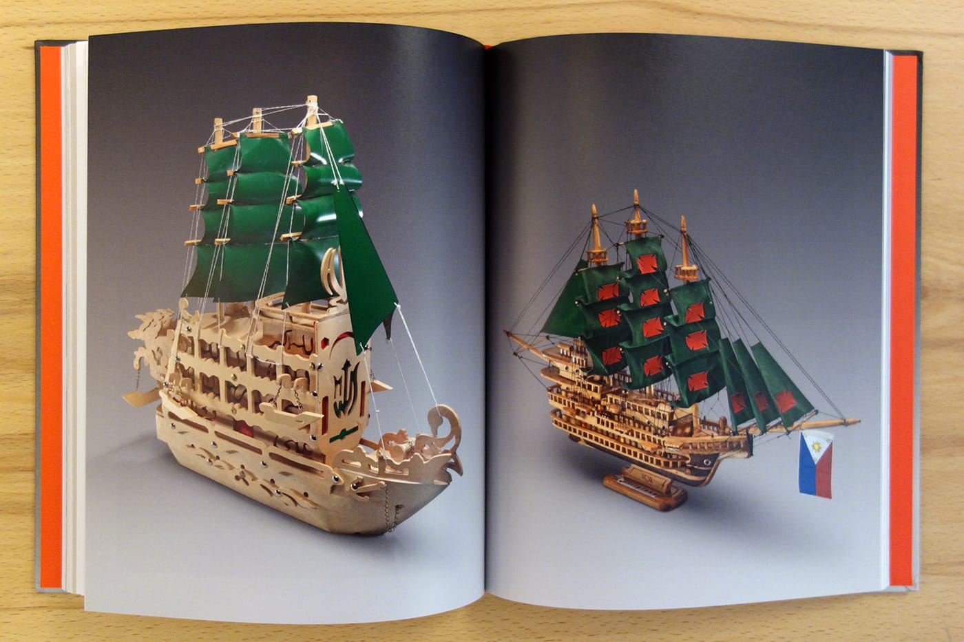 Pages from <em>Prisoners' Objects: The Collection of the International Red Cross and Red Crescent Museum</em> (photo of the book for Hyperallergic)