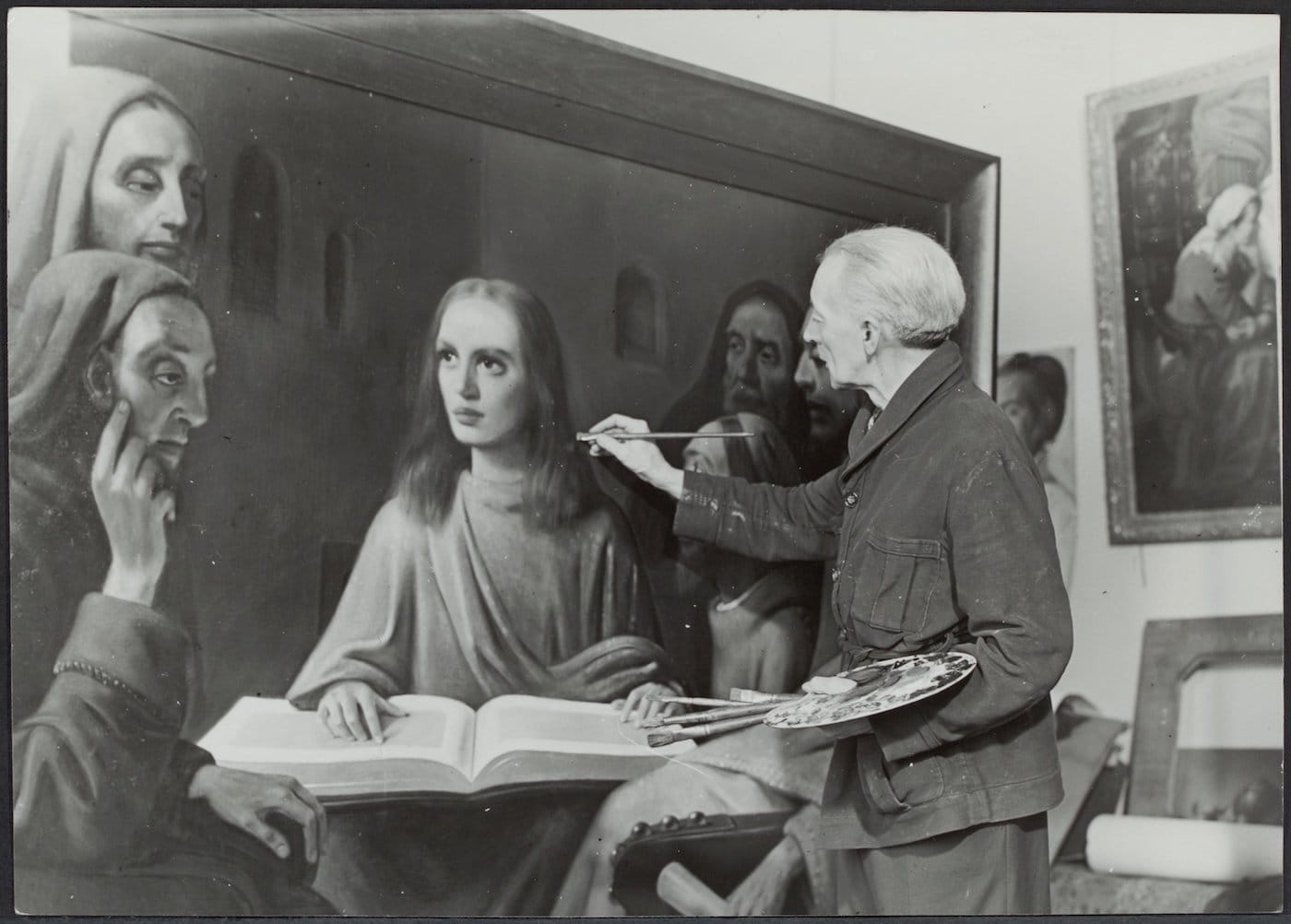 Han van Meegeren posed painting a fake Vermeer (October 1945) (via GaHetNa (Natiionaal Archief NL)/Wikimedia)