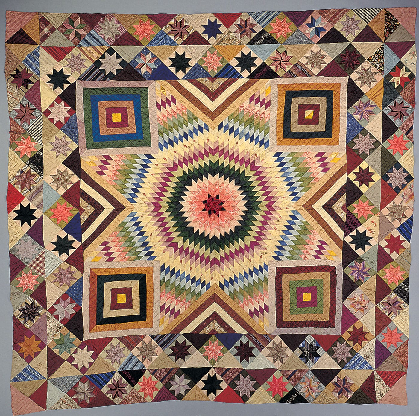 Artist unidentified, "Star of Bethlehem Quilt" (Possibly Sullivan County, New York, 1880–1900), silk, 94 1/4 × 99 inches (American Folk Art Museum purchase made possible with funds from the Great American Quilt Festival 2, photo by Gavin Ashworth)