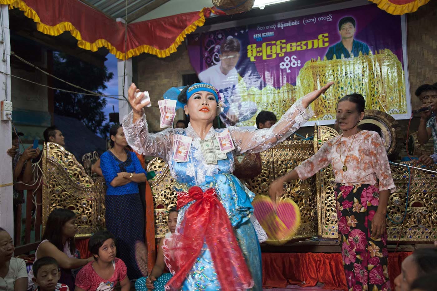 "Male spirit medium (nat kadaw), in Mandalay, performing in song and dance a tale of a female nat" (© Mariette Pathy Allen, from <em>Transcendents: Spirit Mediums in Burma and Thailand</em>, courtesy Daylight Books)