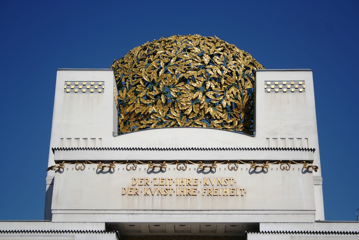 The façade of the Secession building in Vienna includes the group's motto, "To every time its art. To art its freedom." (photo by Greymouser, via Wikipedia)