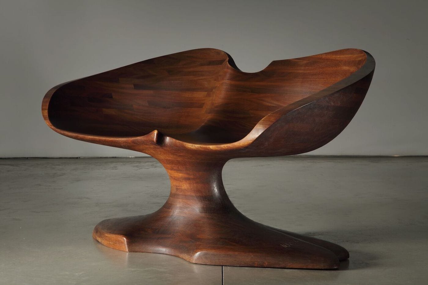 Wendell Castle, "Double Chair" (1967), afromosia wood (photo by Jon Lam, courtesy of Friedman Benda)