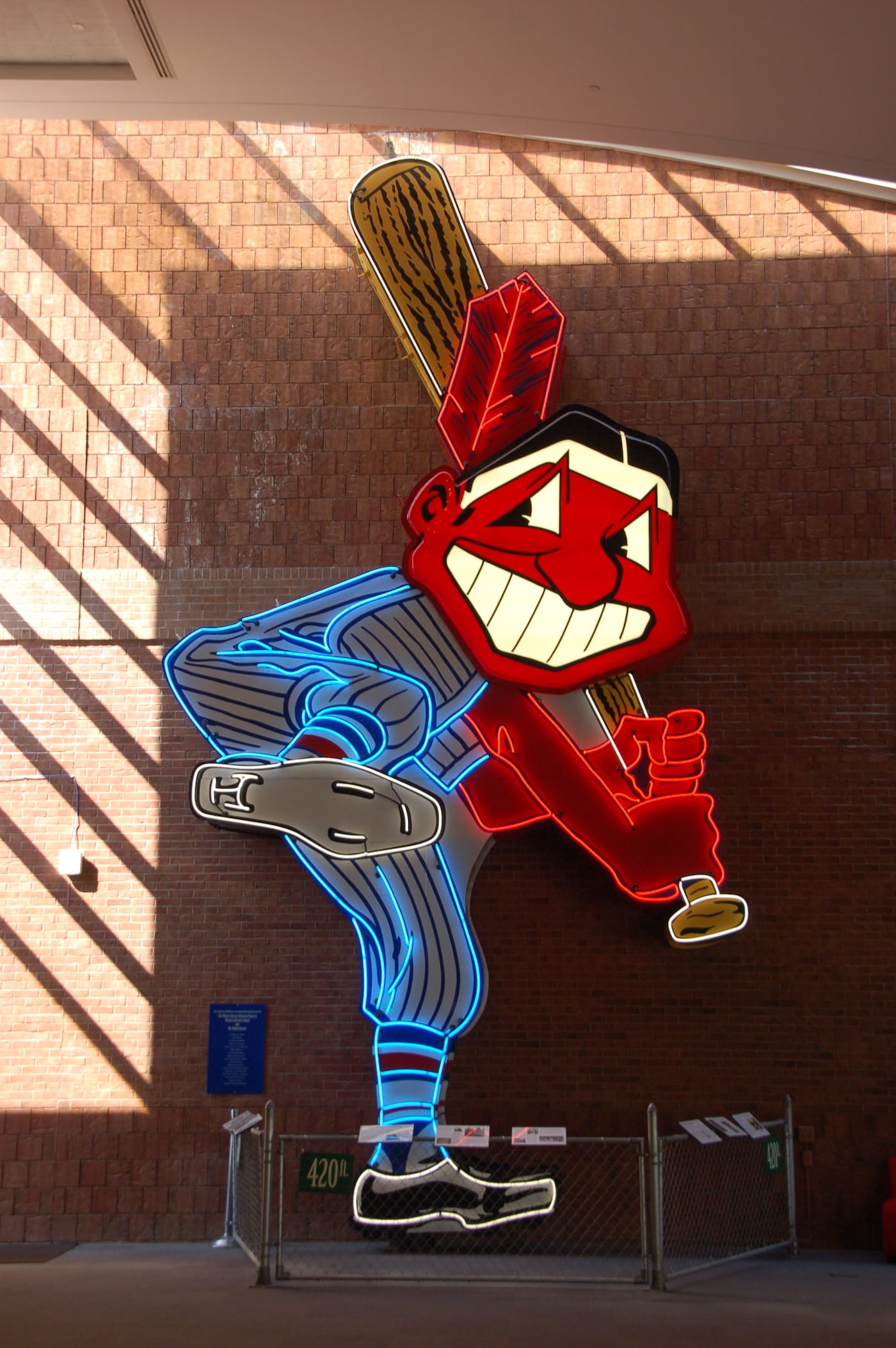 The 28-foot-high Chief Wahoo logo from the Cleveland Indians' former home, Municipal Stadium, on permanent display at Western Reserve Historical Society (photo by Ralf Peter Reimann/Flickr)