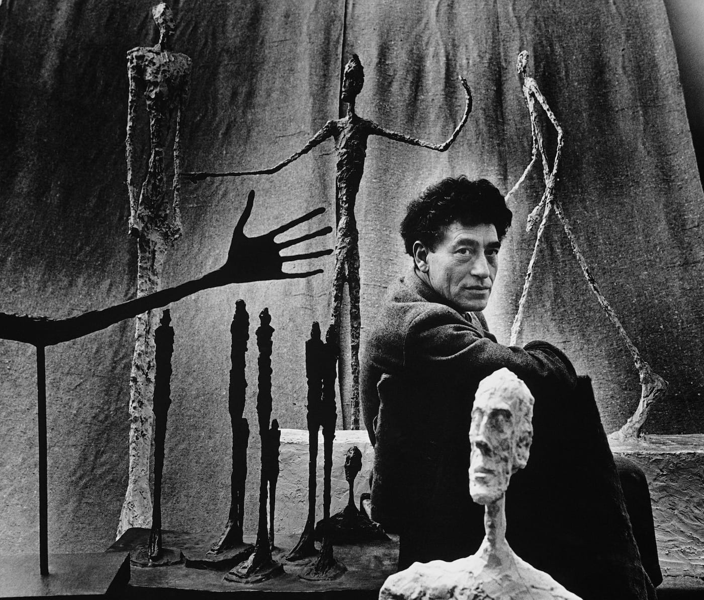 Gordon Parks, "Alberto Giacometti and His Sculptures, Paris, France" (1951), gelatin silver print, 20 x 30 in