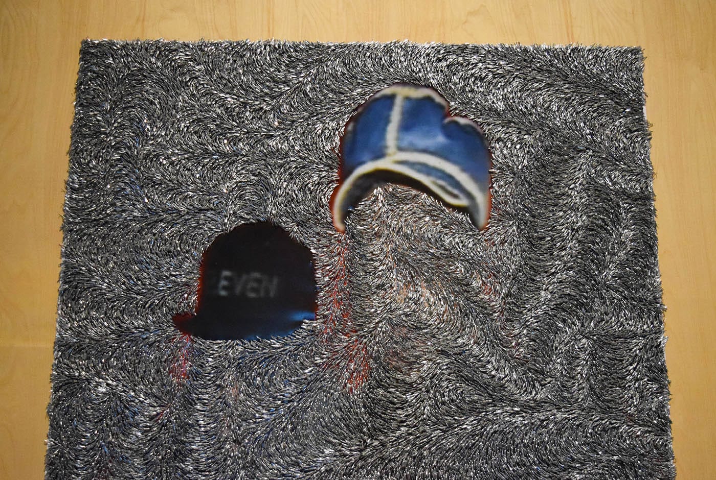 Wilmer Wilson, "ELEVEN" (2017, detail), staples and pigment print on wood