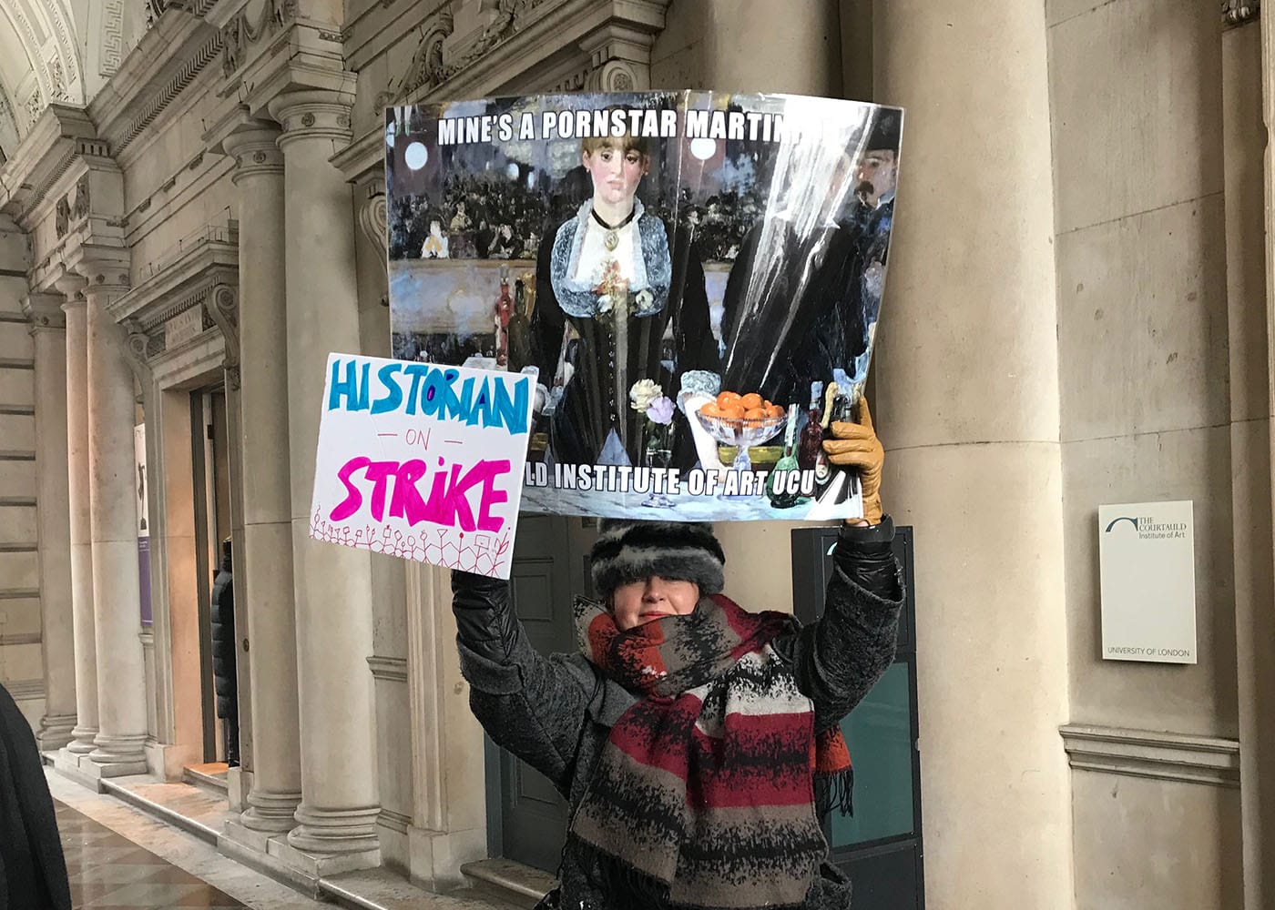 Professor Sarah Wilson from the Courtauld Institute with her protest sign yesterday