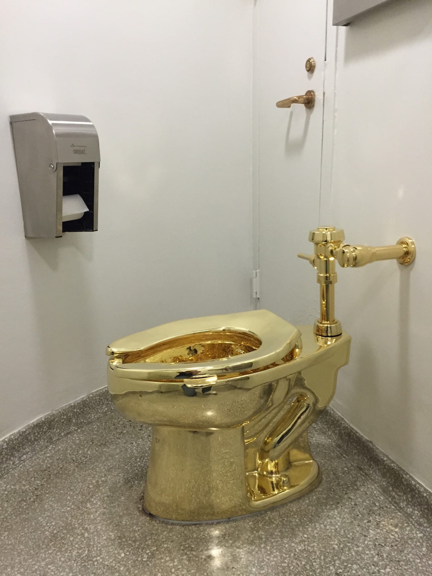 Maurizio Cattelan, “America” (2016), gold (photo by Carey Dunne/Hyperallergic)