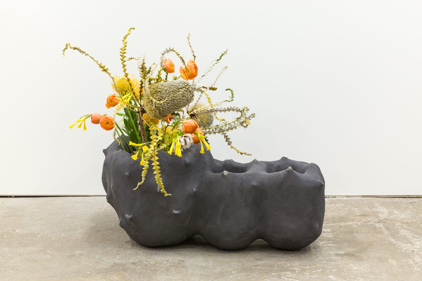 Thomas Barger, "Dicks Creek Rock Planter" (2018), rocks, wooden frame, and stucco, 11 1/2 x 27 x 22 in