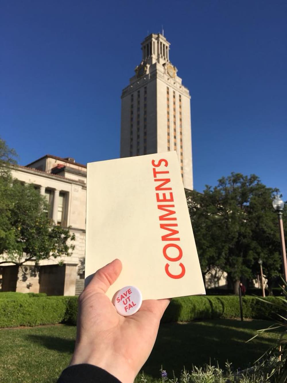 Studio Art and Art History undergraduate Logan Larsen drops off a self-designed zine and a button to the Provost and Dean Dempster at UT-Austin. Larsen is also the designer of many of the posters used by the #SaveUTLibraries campaign. (image by Logan Larsen, used with permission)