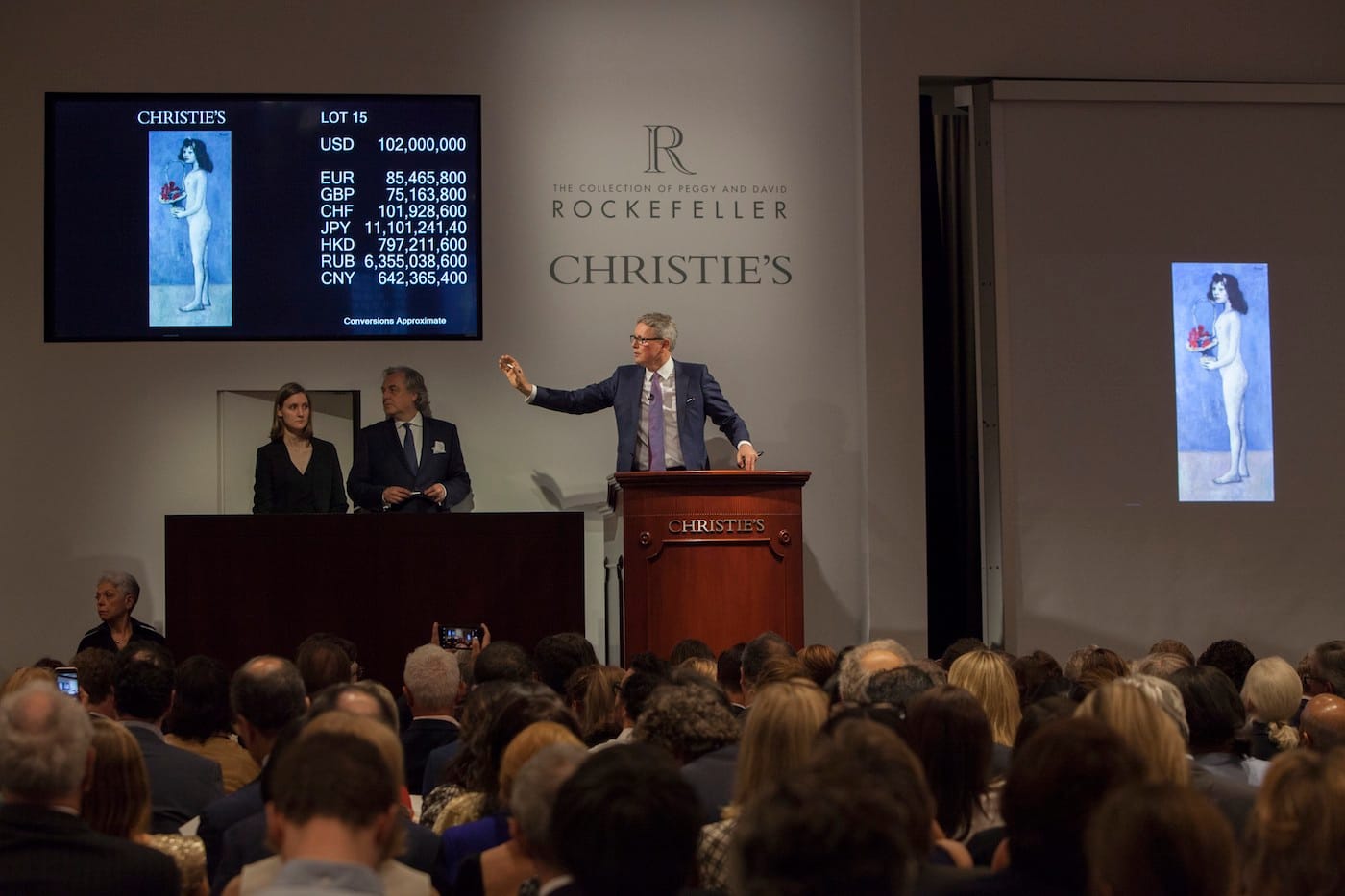 Christie's auctioneer Jussi Pylkkänen soliciting bids on Picasso's "Fillette à la corbeille fleurie" at the May 9 Rockefeller collection evening sale (all images courtesy Christie's)