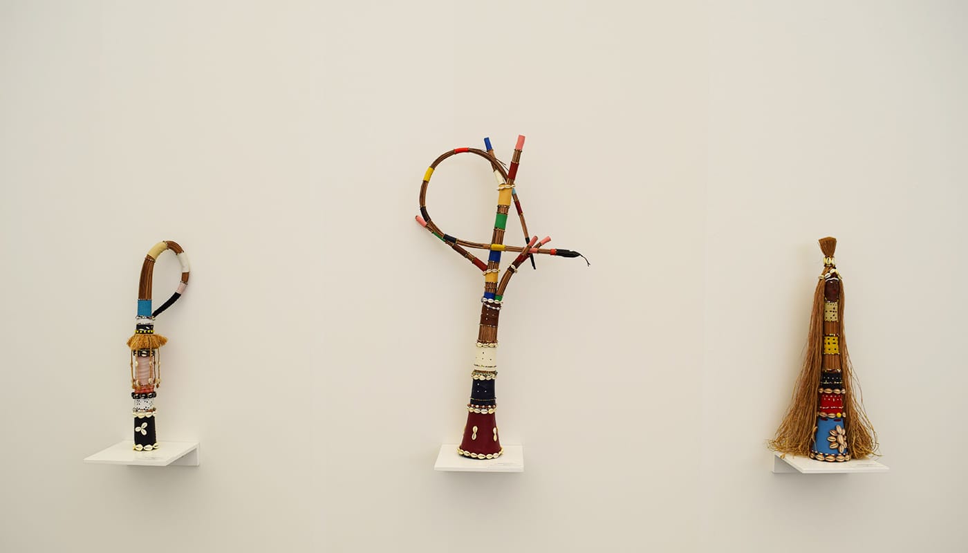 Sculptures by Mestre Didi in the Galeria Marilia Razuk booth at Frieze New York