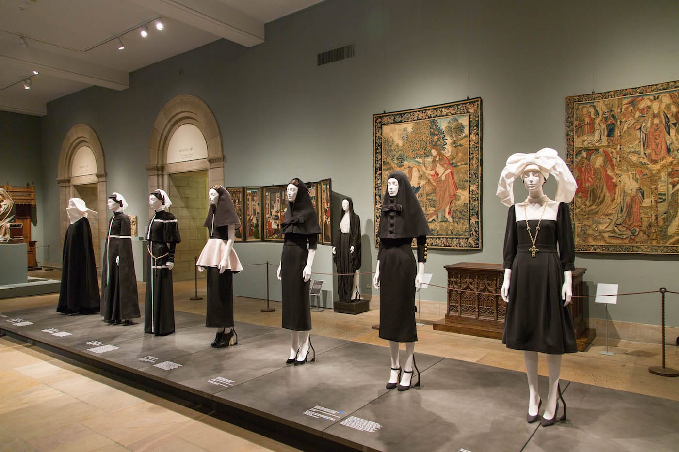 Installation view of <em/>Heavenly Bodies: Fashion and the Catholic Imagination in the Medieval Sculpture Hall