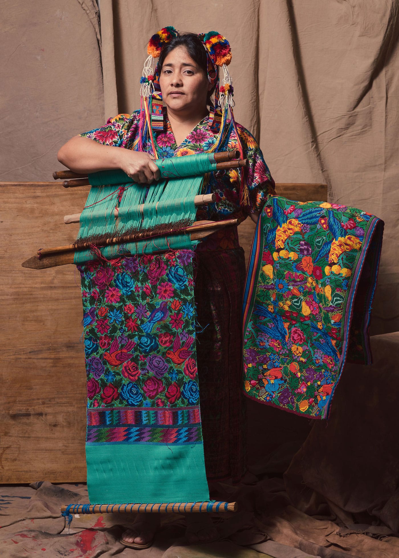 A Mayan backstrap weaver