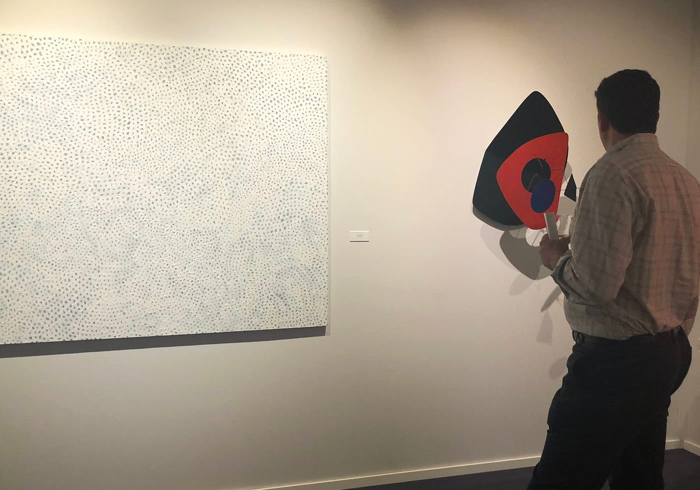 Works by Yayoi Kusama and Alexander Calder in the Stellan Holm booth at TEFAF New York