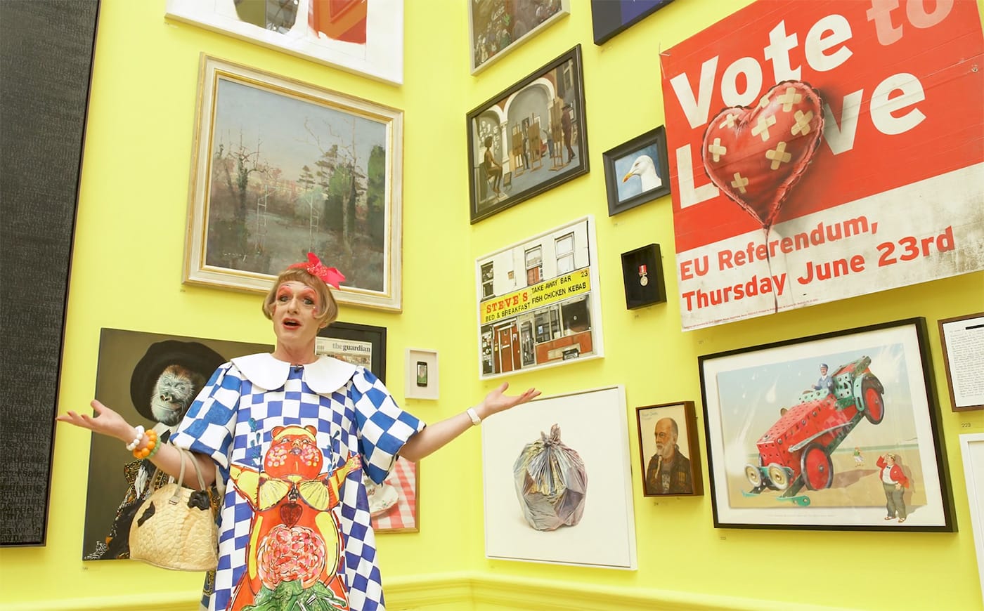 Grayson Perry alongside the Banksy artwork in the Royal Academy's 2018 summer exhibition (screenshot by the author via Vimeo)