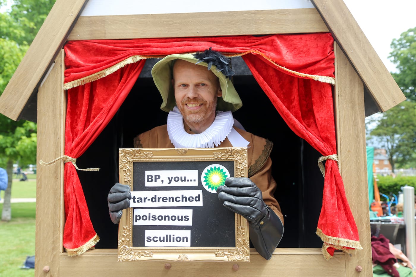 A visitor inside the Shakespearean Insult Booth (photo by Diana Moore)