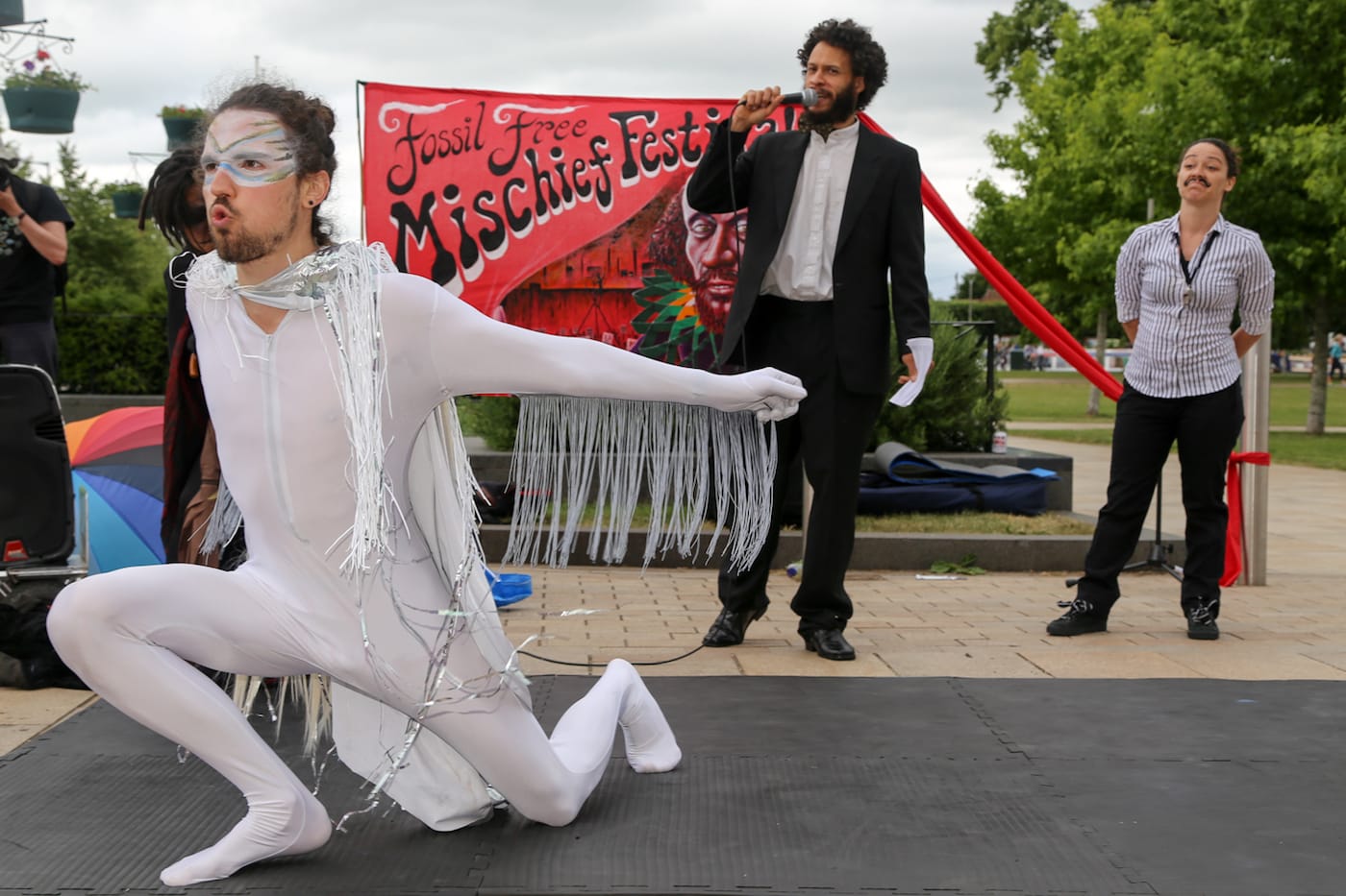 Wind Power prepares to wrestle (performance by the RenewRebels) (photo by Diana More)