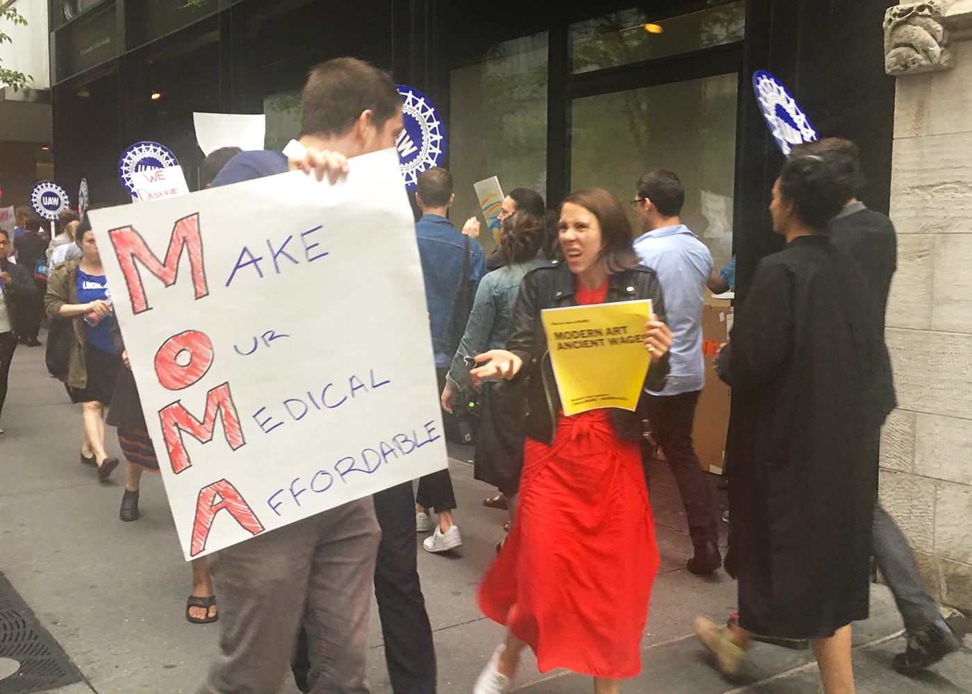 Demonstrators outside the Museum of Modern Art on May 31, 2018, calling for a fair contract for the museum's union workers.