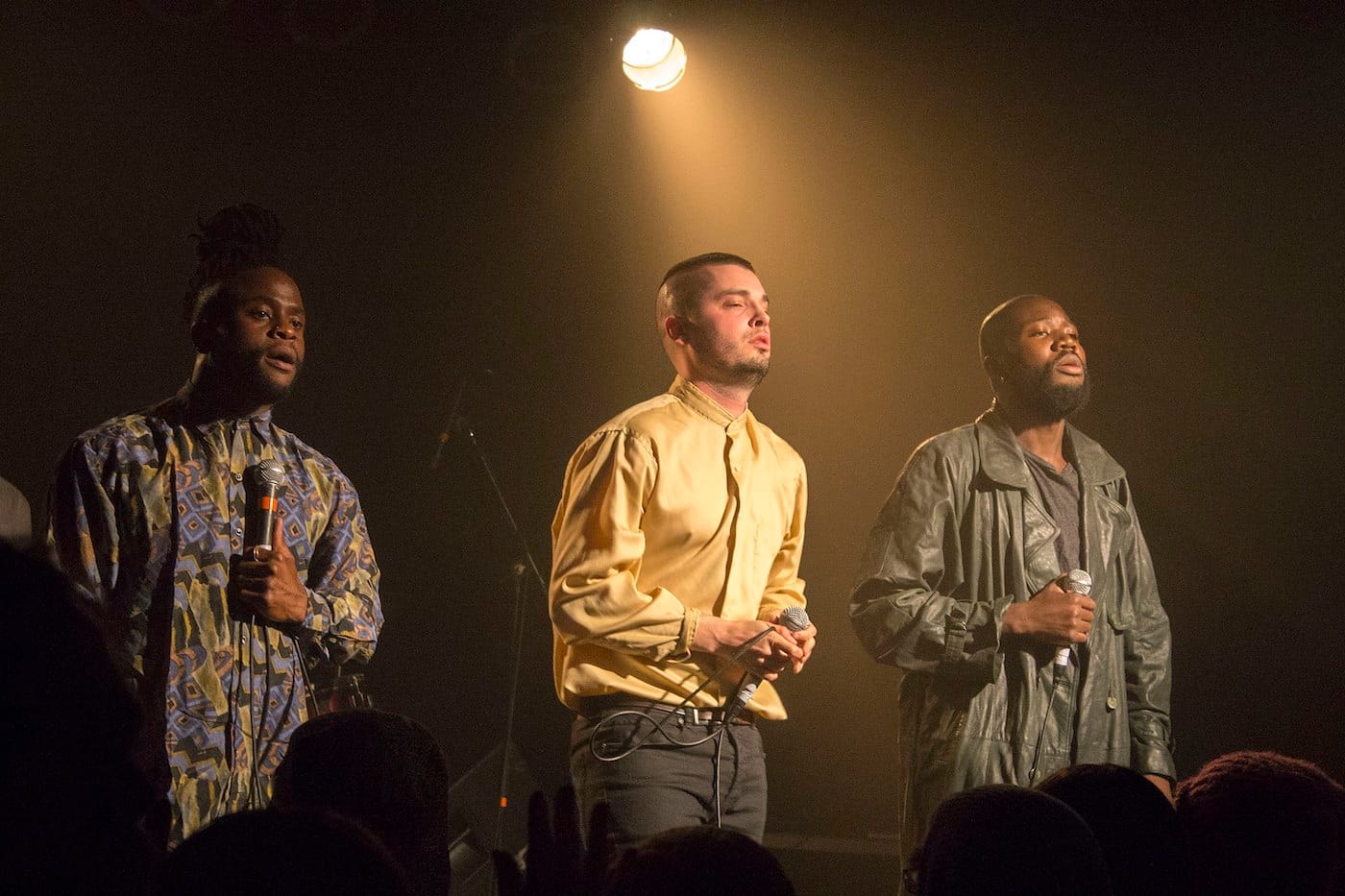 Young Fathers performing in 2014 (photo by Ash link, via Wikimedia Commons)