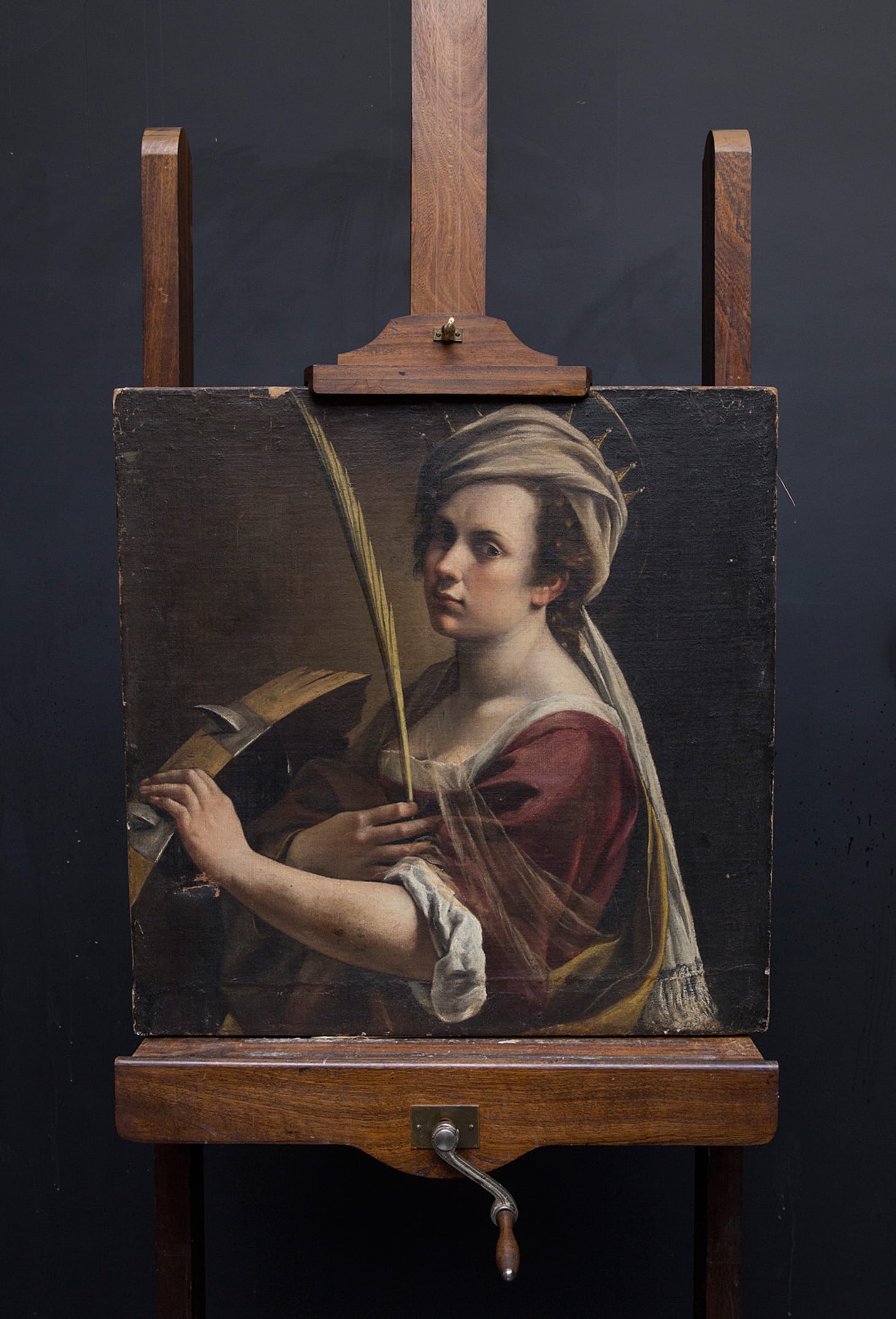 Artemisia Gentileschi, "Self-Portrait as Saint Catherine of Alexandria" on easel (image courtesy of the National Gallery London)
