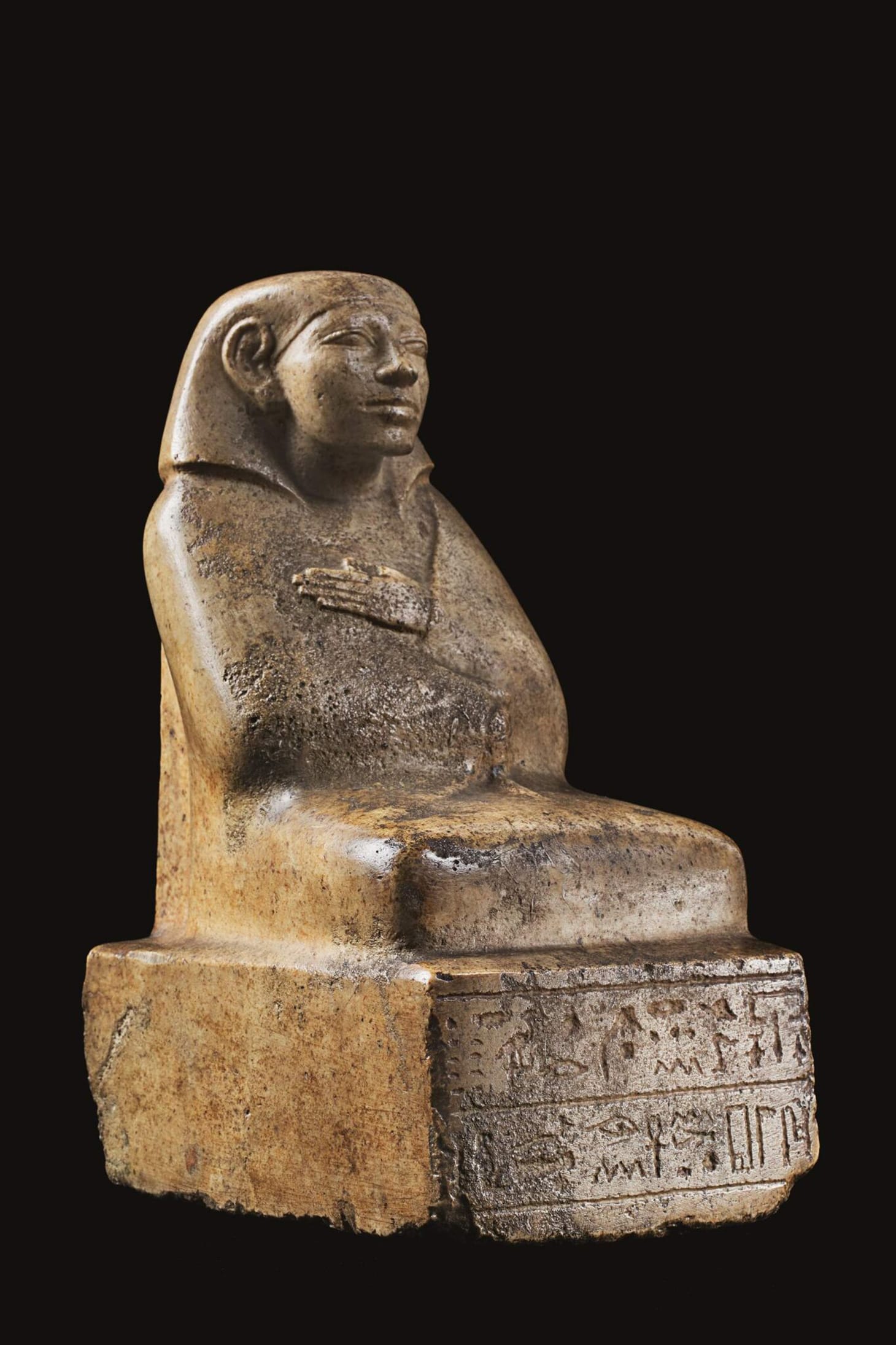 Egyptian indurated limestone figure of the scribe Nekht-ankh from the late 12th/13th dynasty (c. 1800-1700 BCE) (image courtesy of Sotheby's)