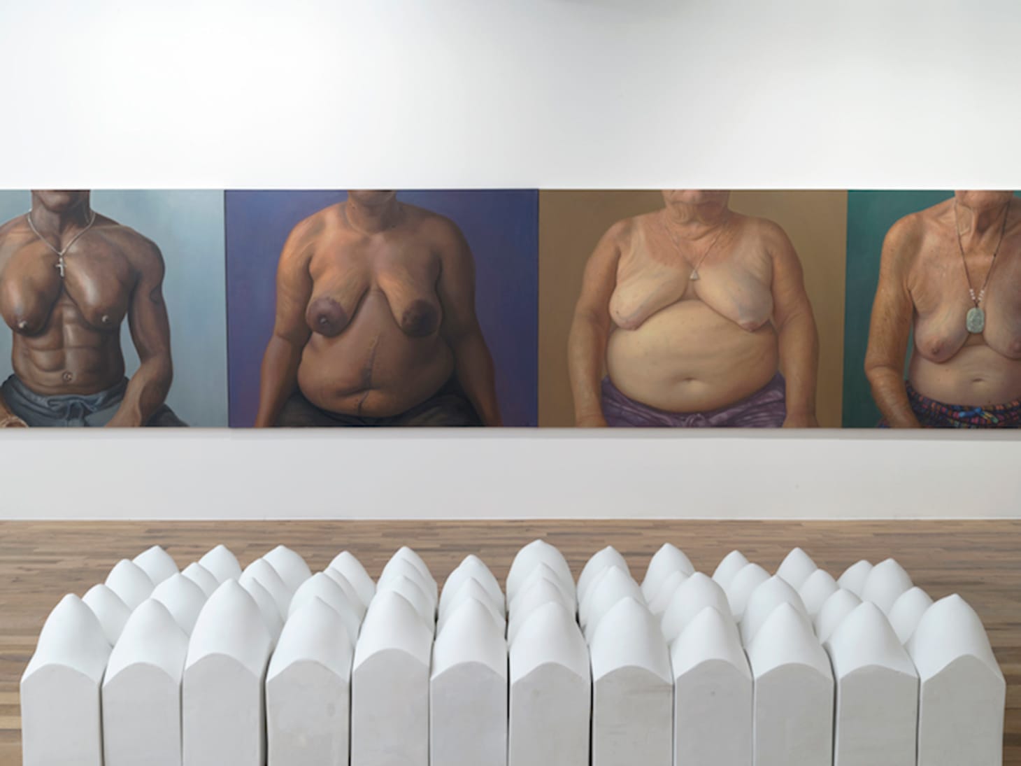 Jill Downen, "Breast Blocks" (2009), plaster, polystyrene, and latex, 48 blocks, each: 19 x 8 1/2 x 8 1/2 in. (image courtesy of the artist and Bruno David Gallery)