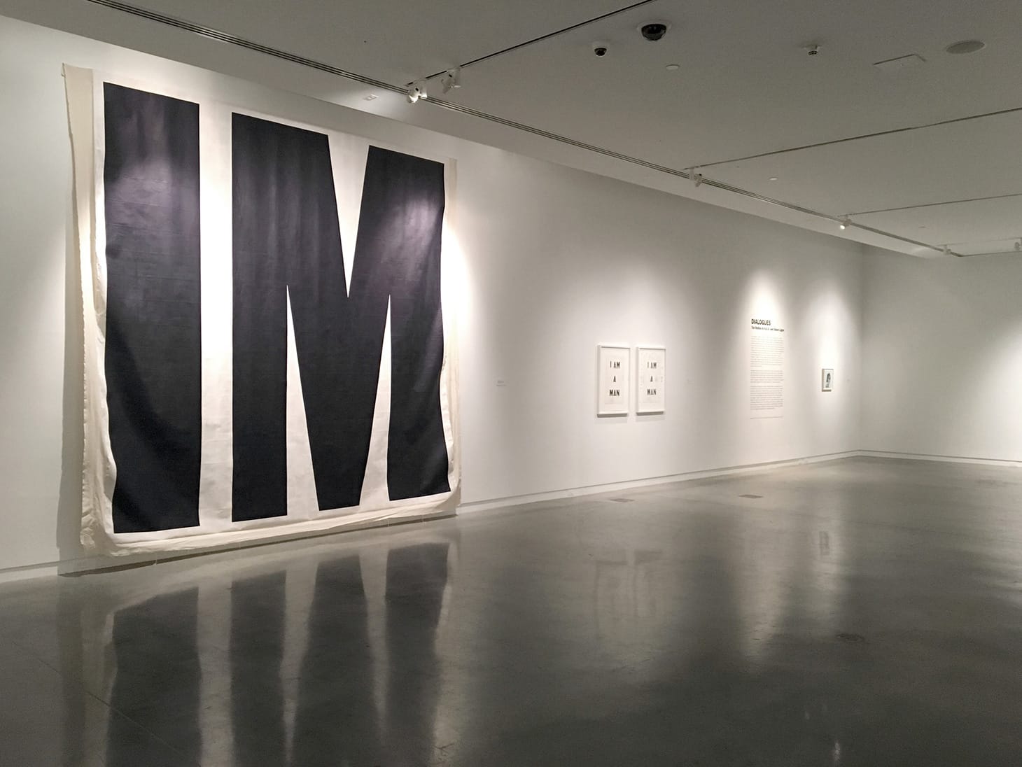 Installation view of <em/>Dialogues: Tim Rollins & K.O.S. and Glenn Ligon at the Bronx Museum of the Arts (2018) (all photos by the author for Hyperallergic) 