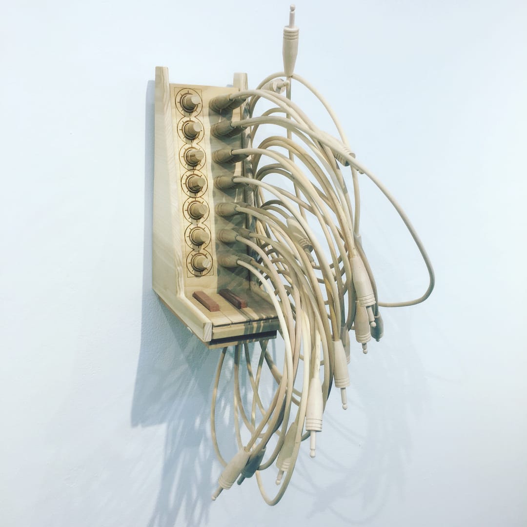 Craig Kaths (2017). Poplar, oak, sapele, and glue. 12" x 14" x 22". Sourced via artist's&nbsp;Instagram account.