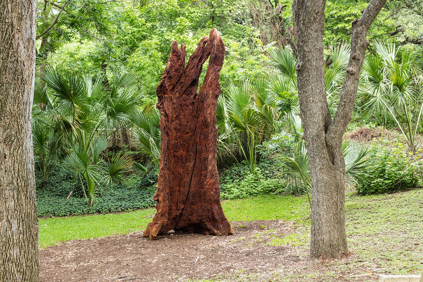 Ai Weiwei, "Iron Tree Trunk" (2015), cast iron, 185 x 63 x 82 5/8 inches, edition 1 of 3, installation view, (collection of The Contemporary Austin, artwork © Ai Weiwei Studio, image courtesy The Contemporary Austin, photo by Brian Fitzsimmons)