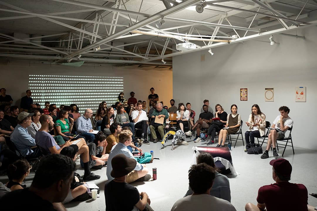 Third year student Marina Xenofontos presents her work to students and faculty, summer 2018. Photo: Pete Mauney