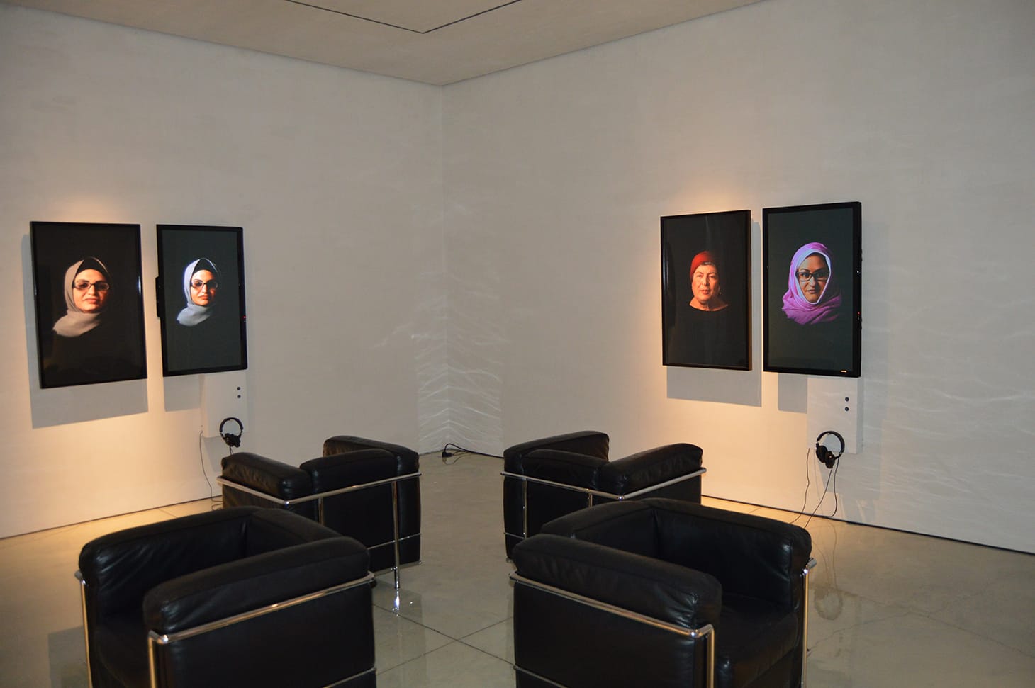 <em>Cairo Stories</em> video stills, installation view (all images by the author for Hyperallergic)