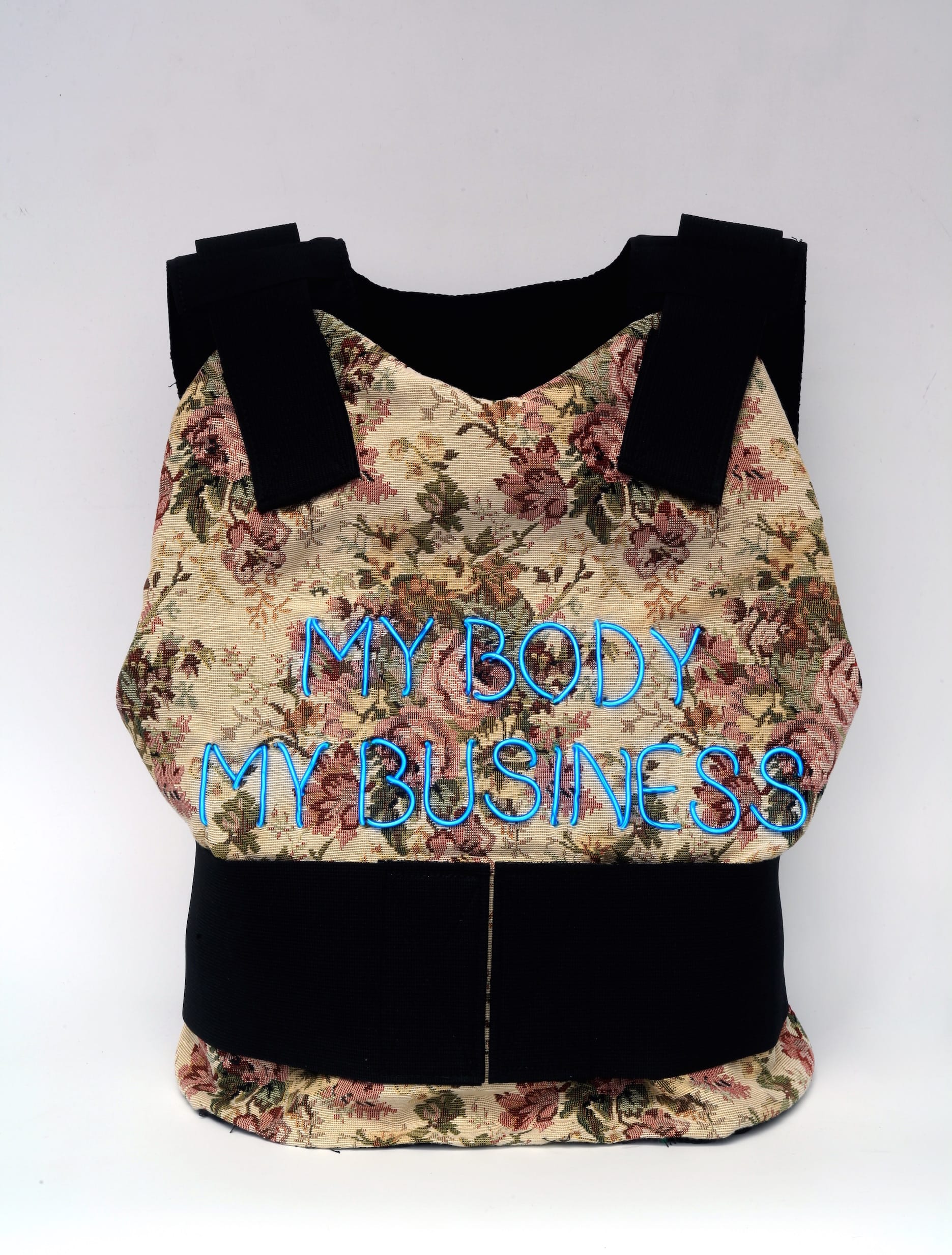 Michele Pred, "My Body My Business" (2018), bullet proof vest, tapestry fabric and electroluminescent wire, to be worn by Pred during the parade