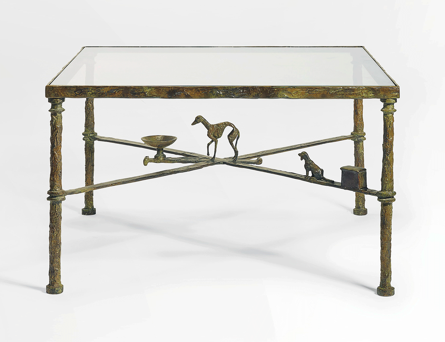 Diego Giacometti, an "En Souvenir de la Levrette Bucky" low table, conceived circa 1978, bronze with green and brown patina, height: 19 inches, width: 32 1/8 inches, depth: 32 1/8 inches (image courtesy Christie's)