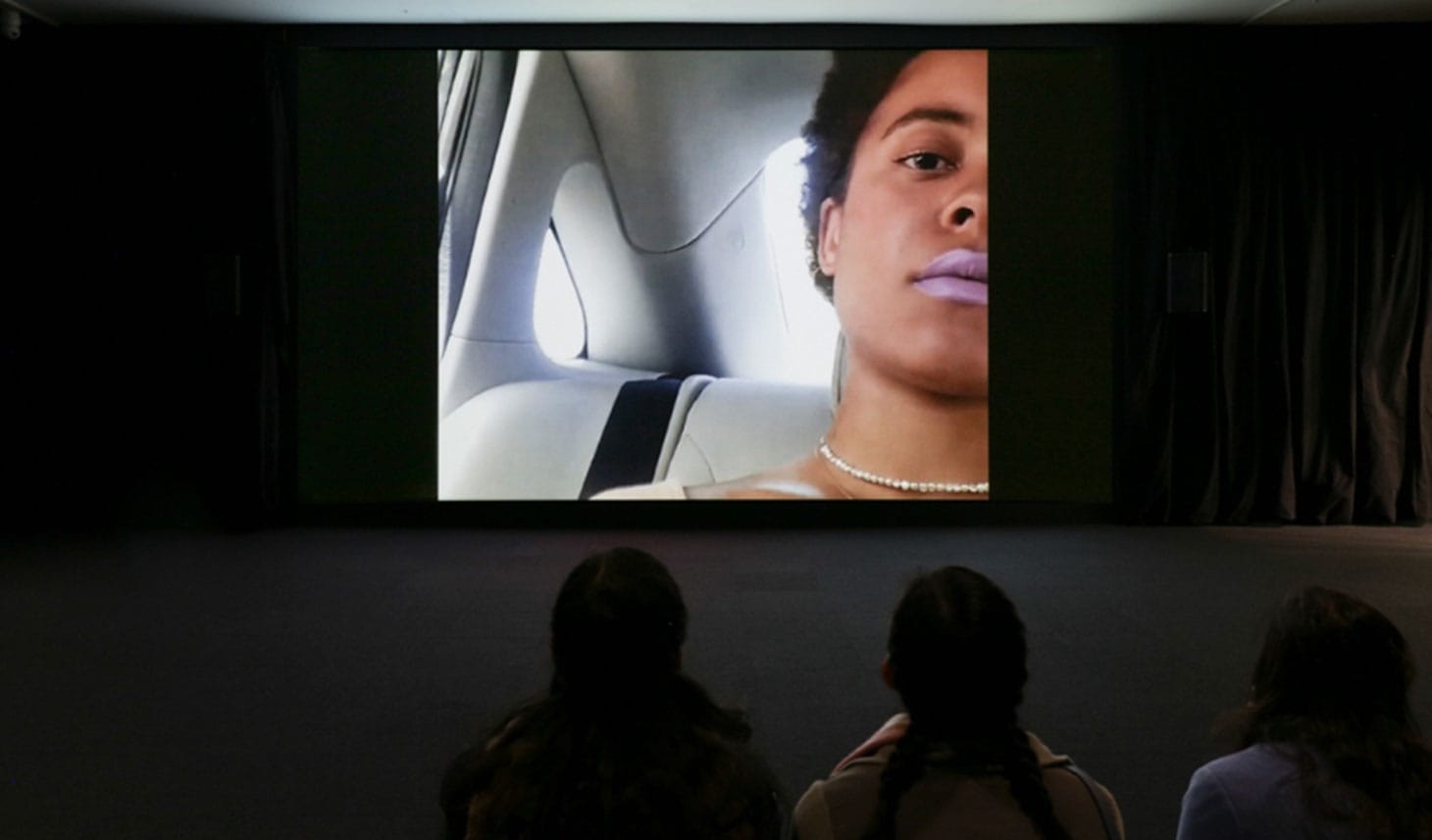 Installation view of Arthur Jafa, “Love is the Message, The Message is Death” (2016) in <em>The Message: New Media Works</em> at the Hirshhorn Museum and Sculpture Garden, 2017 (image courtesy Arthur Jafa and Gavin Brown’s enterprise, New York/ Rome, photo by Cathy Carver)