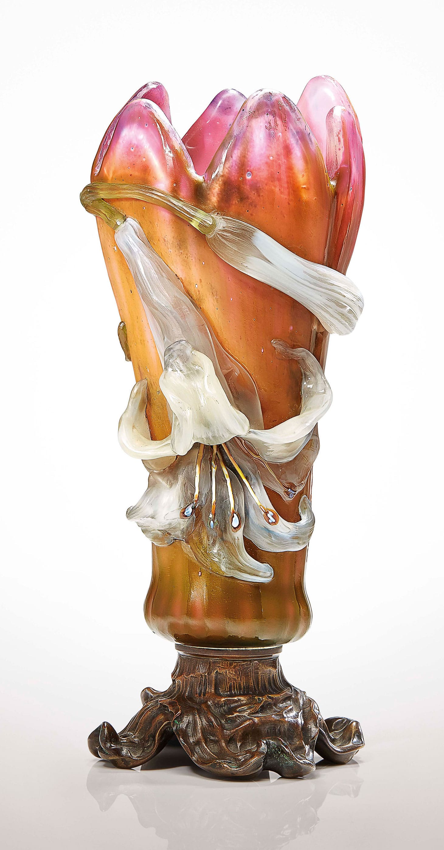Émile Gallé, a "Lys" vase, the vessel in the form of a lily, overlaid, fire-polished, polished to reveal a graduation in color, applied flower and bud with wheel-carved detail, marquetry stamens, patinated bronze base with snail detail, 12 3/4 inches high (image courtesy Christie's)
