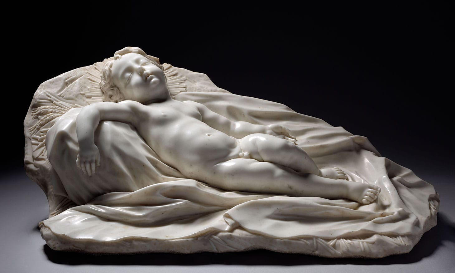 Filippo Parodi, "Sleeping Christ Child" (c. 1675), marble, 63 x 102 x 42 cm. (image courtesy The Cleveland Museum of Art, Bequest of Leonard C. Hanna Jr.)